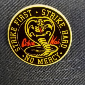 Cobra Kai 80s Aesthetic Pin NEW "Strike First Strike Hard No Mercy"